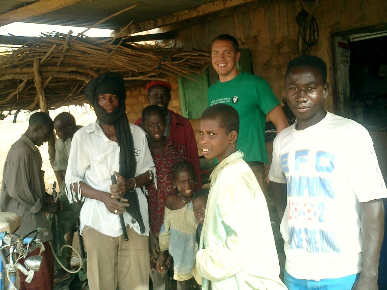 man standing with group of people in Burkina Faso