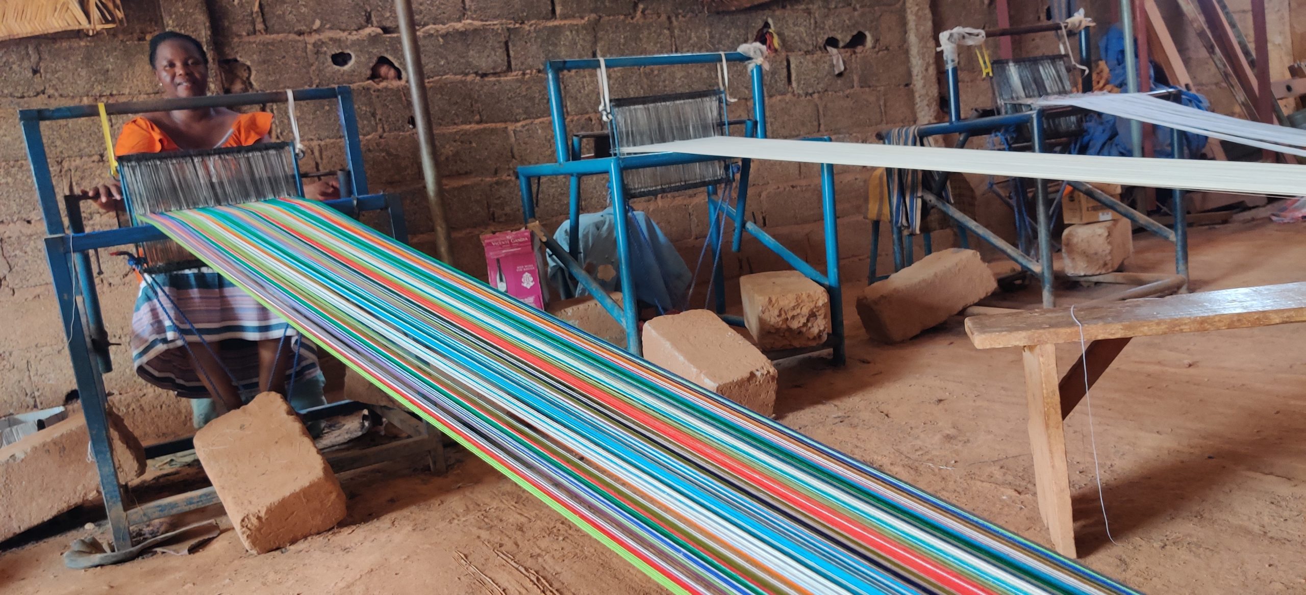 woman weaving burkina faso fabric