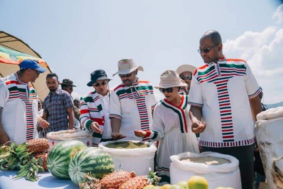 government official observing mung beans