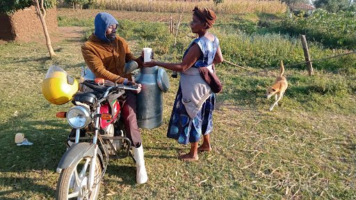 dairy farmer selling mil to person on motorcycle